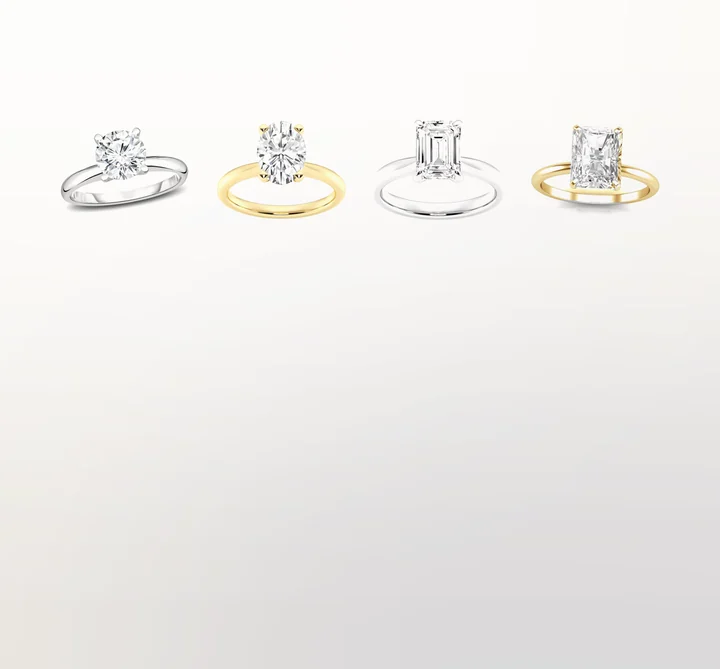 Four solitaire engagement rings: round, oval, emerald and radiant centers