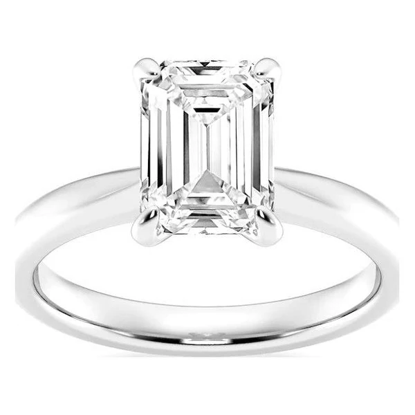 Classic Solitaire · Emerald in white gold